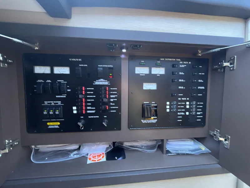 Slide: The Image of Electrical control panel inside 2016 Sea Ray 470 Sundancer yacht. - 26