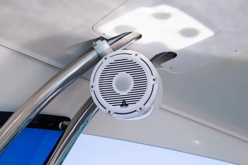 Slide: The Image of Speaker on 2018 Prestige 560 Flybridge yacht, mounted on a sleek metal frame. - 10