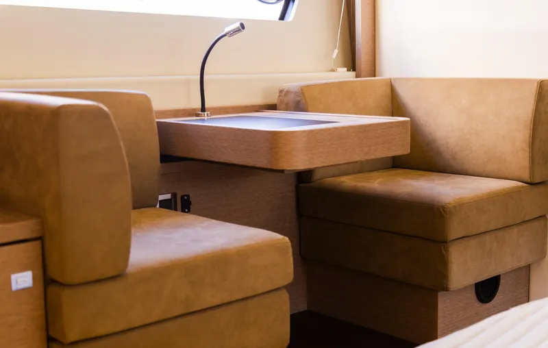 Slide: The Image of Luxurious seating area inside 2018 Prestige 560 Flybridge yacht with modern design. - 27