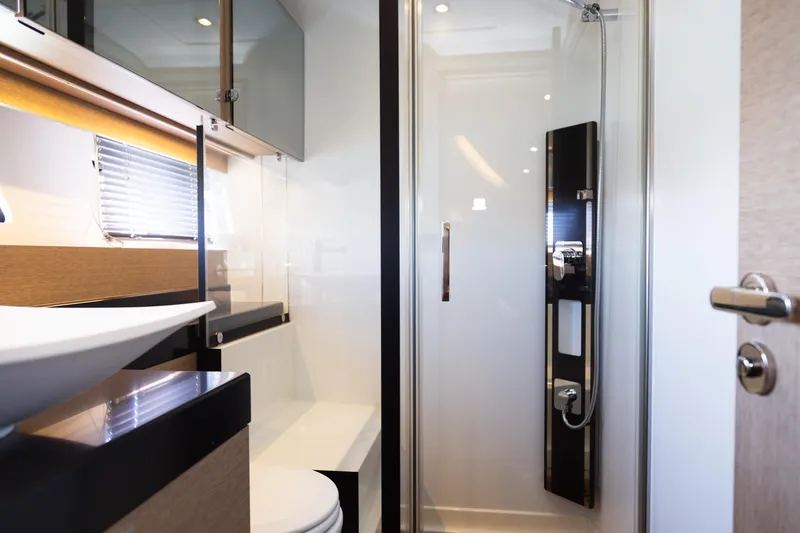 Slide: The Image of Luxurious bathroom in 2018 Prestige 560 Flybridge yacht with modern shower and sleek design. - 44
