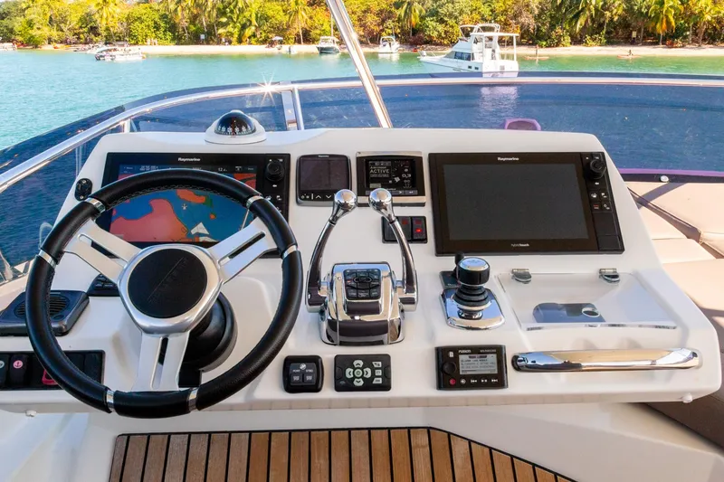 Slide: The Image of Cockpit of 2018 Prestige 560 Flybridge yacht with modern navigation equipment. - 7