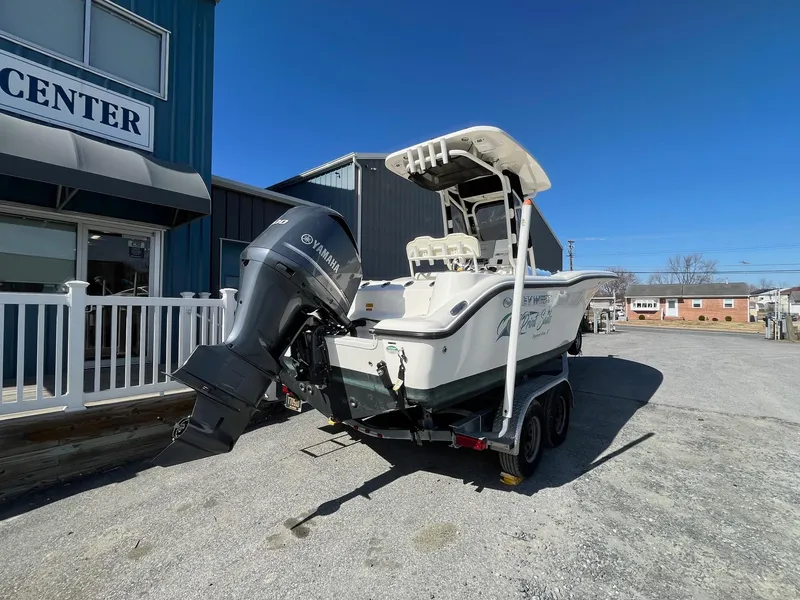 Slide: The Image of 2019 Key West 244 Center Console boat with Yamaha outboard motor on trailer. - 5