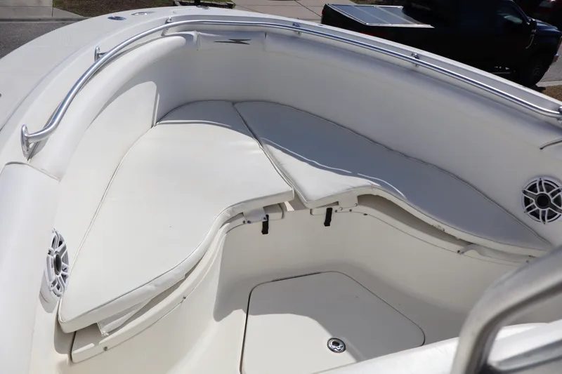 Slide: The Image of 2000 Hydra-Sports 2796 Vector boat with white cushioned seating and stainless steel railings. - 13