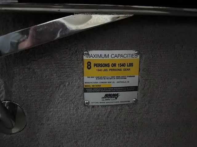 Slide: The Image of Capacity label on 2006 Stingray 200 CX Cuddy, max 8 persons or 1540 lbs. - 10