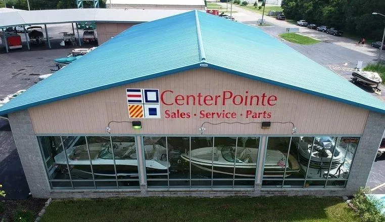 Slide: The Image of Aerial view of CenterPointe building showcasing boats, including a 2006 Stingray 200 CX Cuddy. - 21