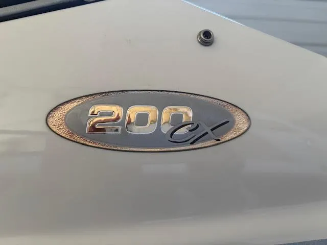 Slide: The Image of 2006 Stingray 200 CX Cuddy emblem on boat exterior. - 3