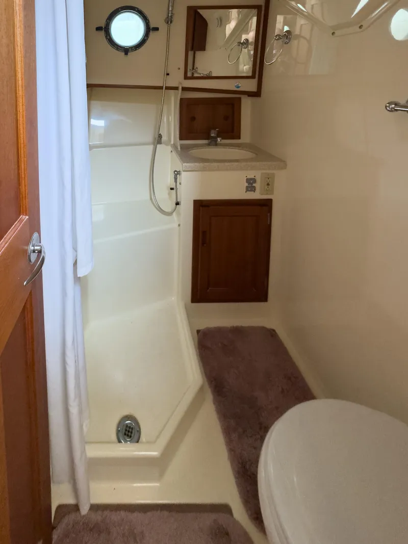 Slide: The Image of Bathroom interior of 2006 Nordic Tug 32' Plus with shower and sink. - 18