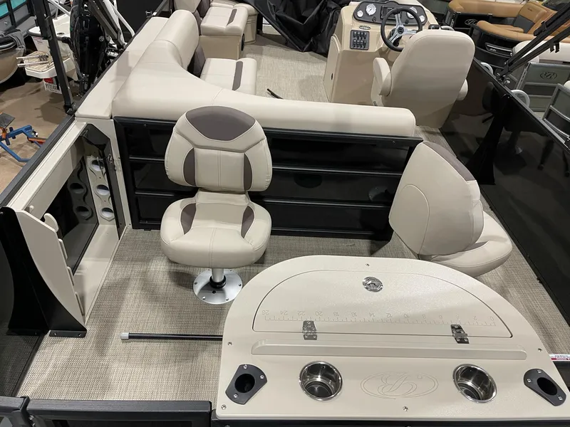 Slide: The Image of 2025 Bentley Pontoons 223 Fish interior with beige seating and fishing station. - 16