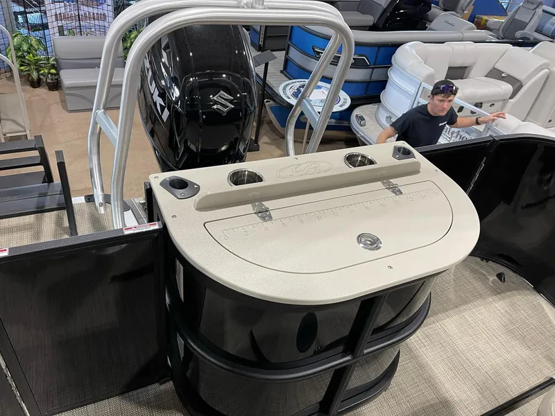 Slide: The Image of 2025 Bentley Pontoons 223 Fish boat interior with seating and motor. - 18