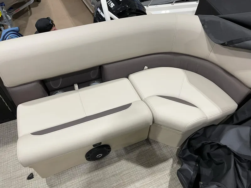 Slide: The Image of 2025 Bentley Pontoons 223 Fish interior seating with beige and brown upholstery. - 7