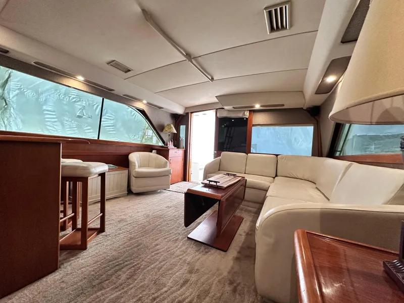 Slide: The Image of 1990 Ocean Yachts 48 Super Sport helm with Garmin navigation system and steering wheel. - 15