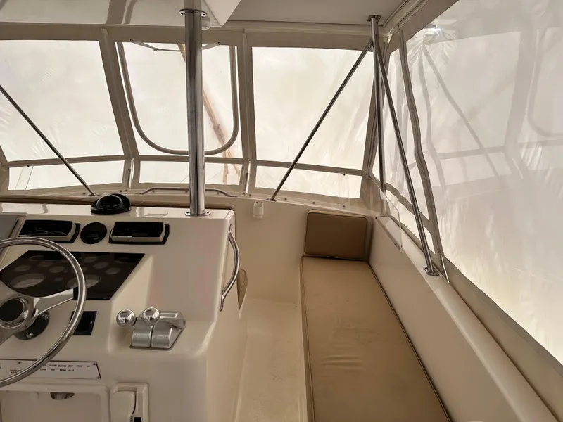 Slide: The Image of Ocean Yachts 48 Super Sport 1990, cabin entrance with ladder and wooden door. - 10