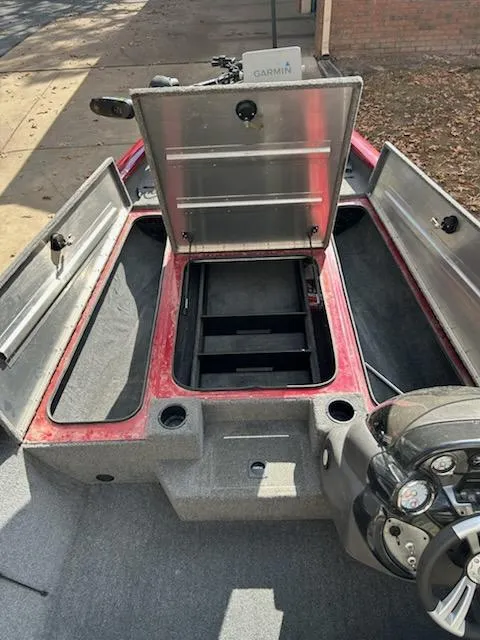 Slide: The Image of 2020 Tracker Pro Team 190 TX Tournament Edition boat interior with open storage compartments. - 4
