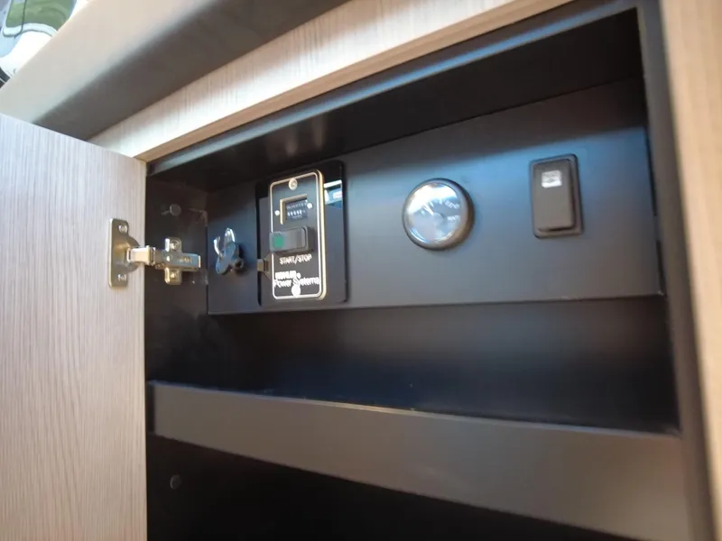 Slide: The Image of Control panel inside cabinet of 2023 Cranchi A46 yacht. - 29