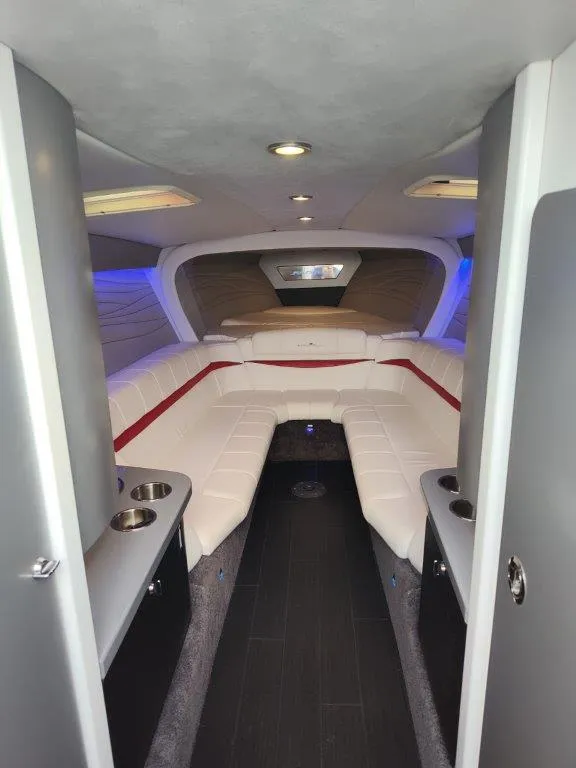 Slide: The Image of Interior of a 2015 Formula 382 FASTech boat with modern seating and ambient lighting. - 16