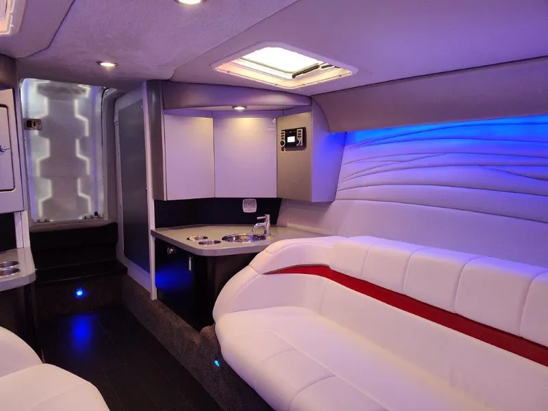 Slide: The Image of Luxurious interior of a 2015 Formula 382 FASTech boat with modern lighting and seating. - 17