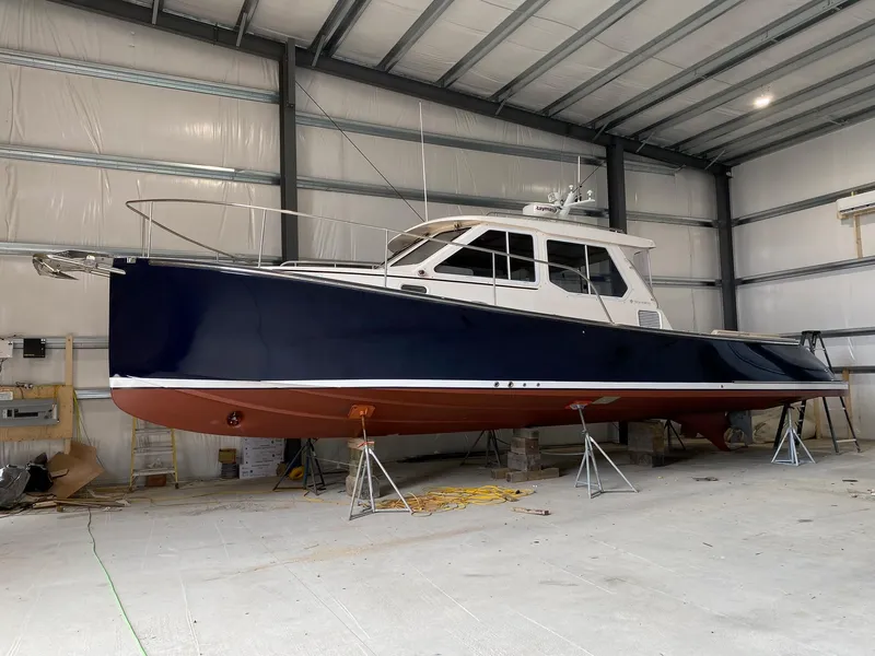 Slide: The Image of 2010 Pearson 38 True North boat in a storage facility. - 33