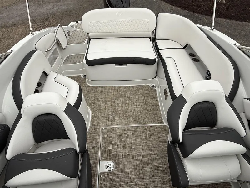 Slide: The Image of 2024 Crownline Eclipse E240 XS boat interior with luxurious seating and modern design. - 5