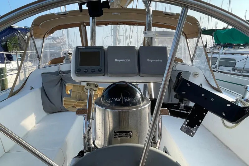 Slide: The Image of Cockpit of 1995 Catalina 36 MkII sailboat with navigation equipment and compass. - 14