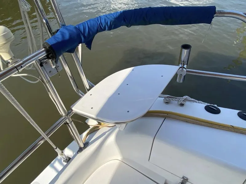 Slide: The Image of Sailboat deck detail of a 1995 Catalina 36 MkII, featuring a swim platform and railing. - 15