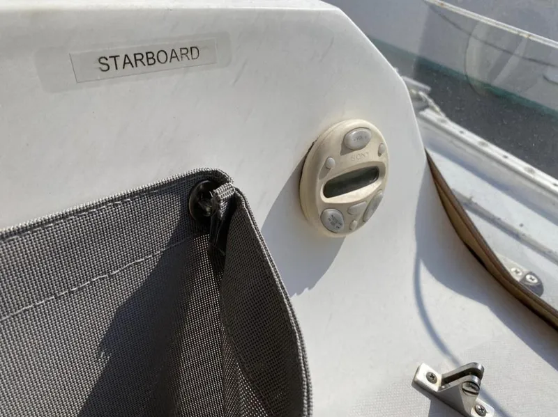 Slide: The Image of Starboard side of 1995 Catalina 36 MkII sailboat with storage pocket and control panel. - 18