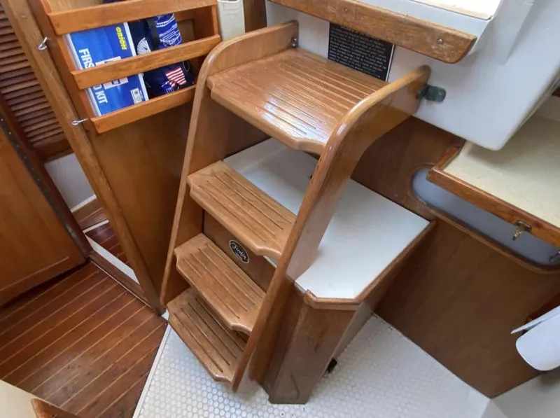 Slide: The Image of Wooden steps inside a 1995 Catalina 36 MkII sailboat cabin. - 30
