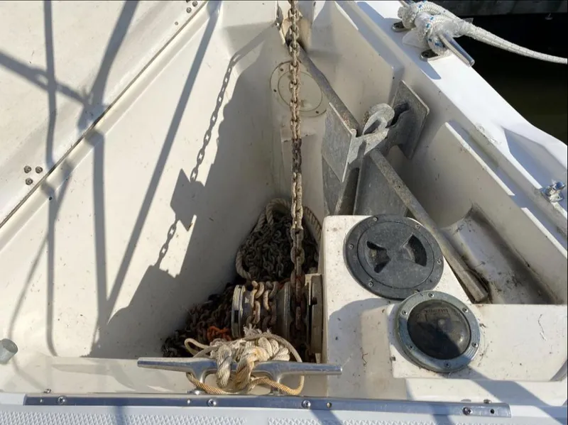Slide: The Image of Anchor chain and winch on a 1995 Catalina 36 MkII sailboat deck. - 9