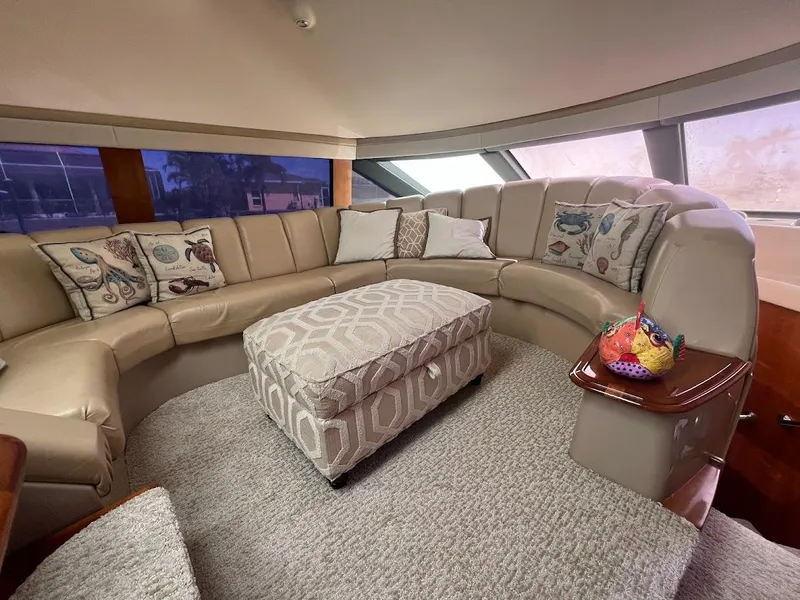 Slide: The Image of Luxurious interior of 2006 Carver Voyager Sky Lounge with plush seating and elegant decor. - 15