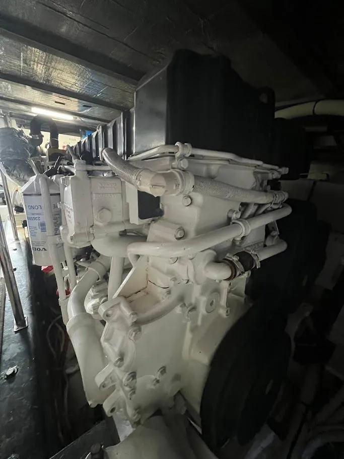 Slide: The Image of Engine of a 2006 Carver Voyager, showcasing intricate mechanical components. - 44