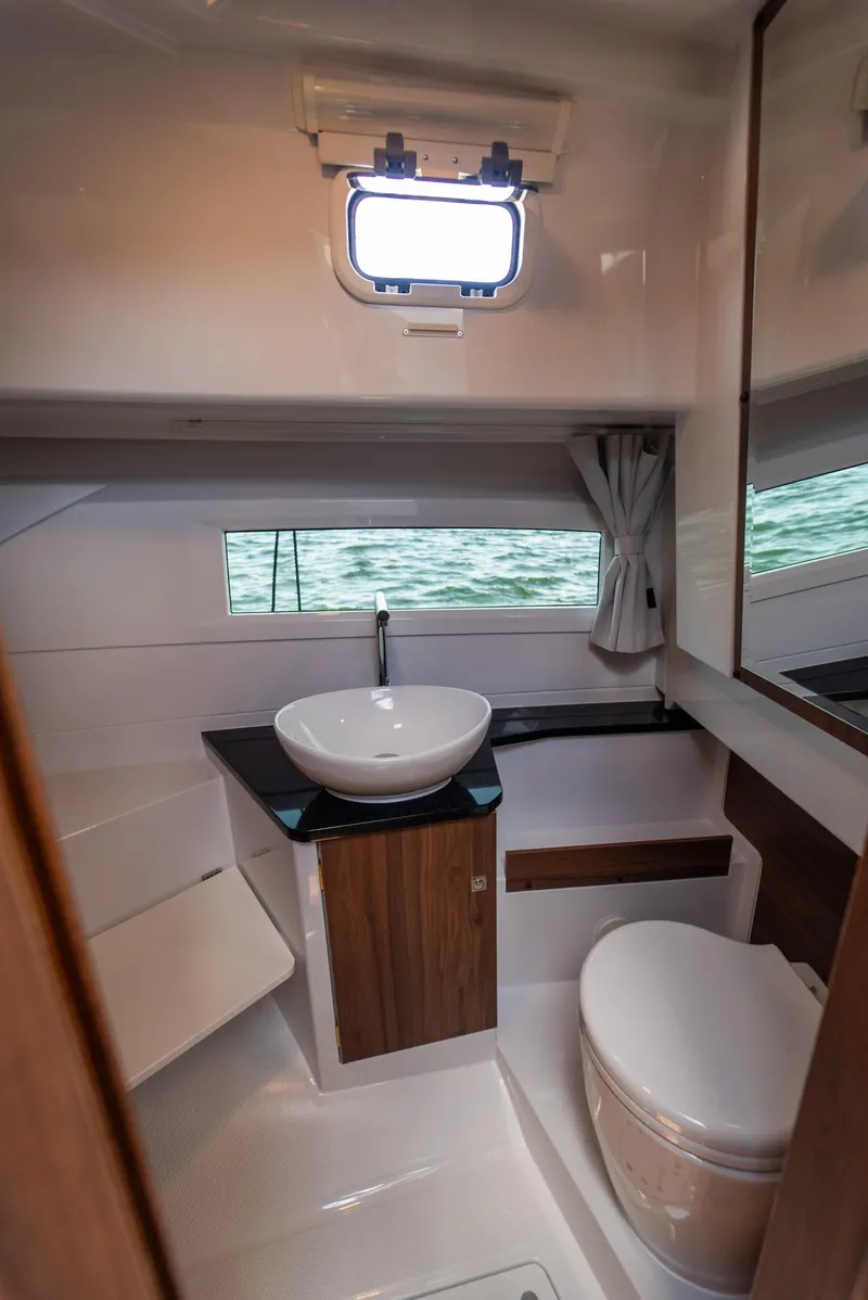 Slide: The Image of Modern bathroom interior of 2025 Nautic 880 boat with sink and toilet. - 20