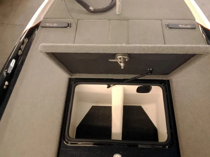 Slide: The Image of 2020 Bass Cat Puma FTD boat storage compartment with open lid. - 18