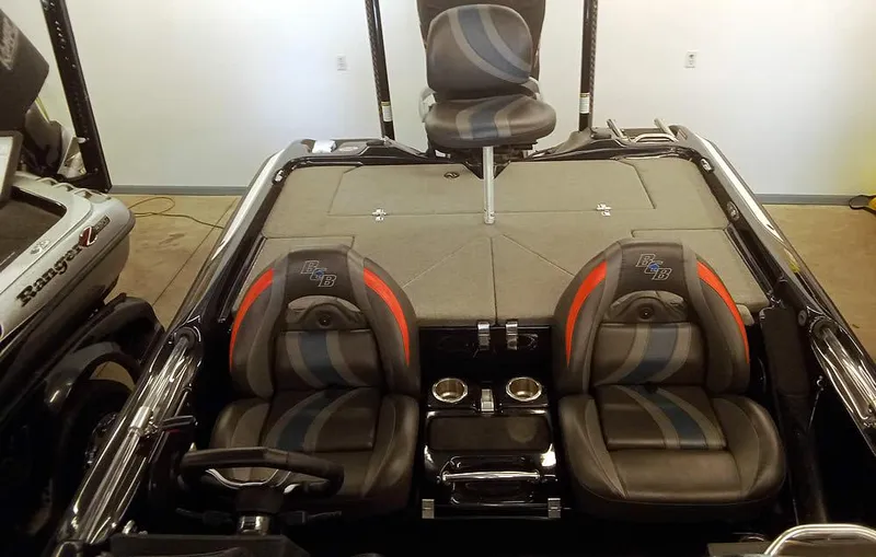 Slide: The Image of 2020 Bass Cat Puma FTD boat interior with dual seats and steering wheel. - 20