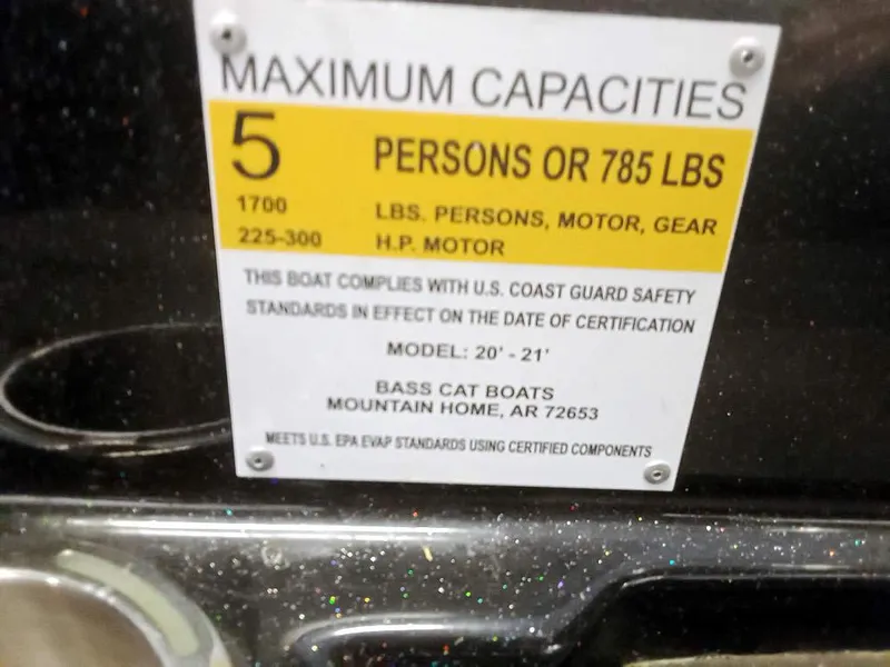 Slide: The Image of 2020 Bass Cat Puma FTD capacity label, 5 persons or 785 lbs, U.S. Coast Guard compliant. - 23