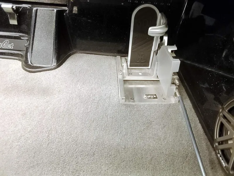 Slide: The Image of Bass Cat Puma FTD 2020 boat foot pedal and carpeted interior detail. - 25
