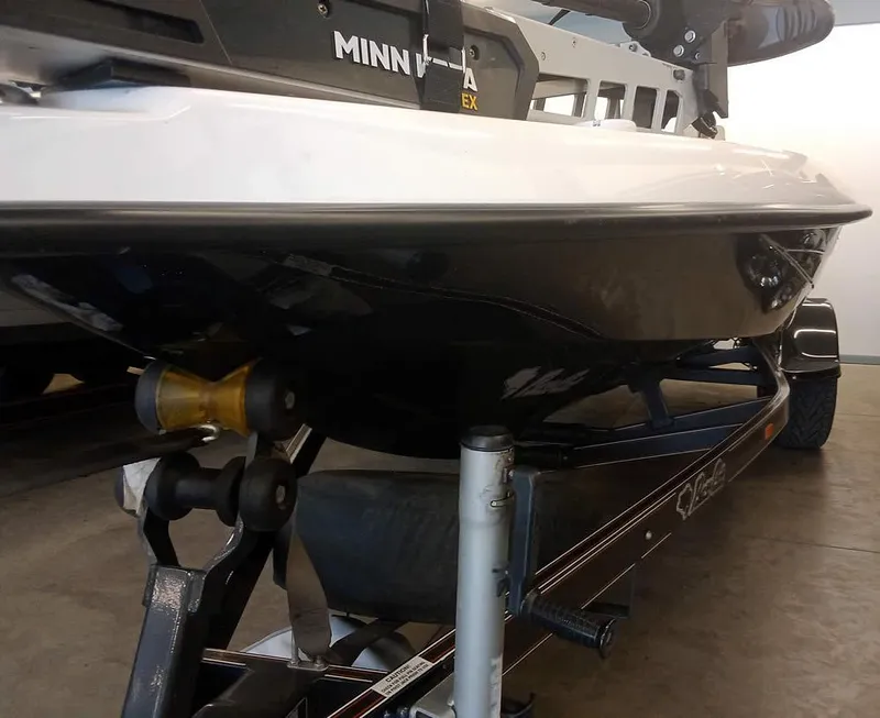 Slide: The Image of 2020 Bass Cat Puma FTD boat on trailer with Minn Kota motor. - 5