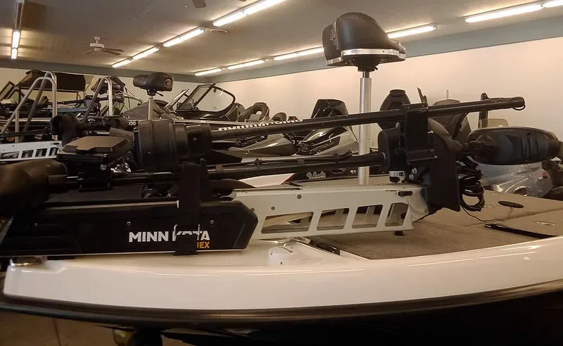 Slide: The Image of 2020 Bass Cat Puma FTD boat with Minn Kota trolling motor in showroom. - 8