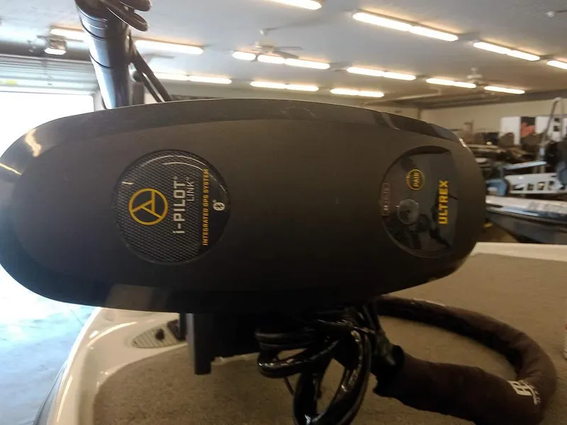 Slide: The Image of 2020 Bass Cat Puma FTD with Minn Kota Ultrex trolling motor in a showroom. - 9