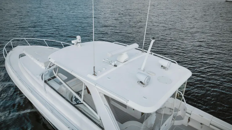 Slide: The Image of 2018 Intrepid 475 Sport Yacht on water, aerial view. - 14