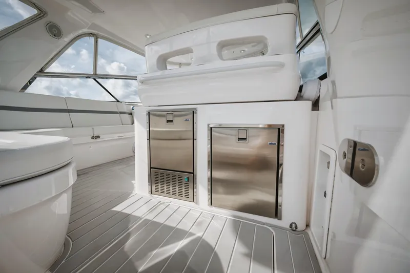 Slide: The Image of 2018 Intrepid 475 Sport Yacht interior with sleek design and stainless steel appliances. - 26