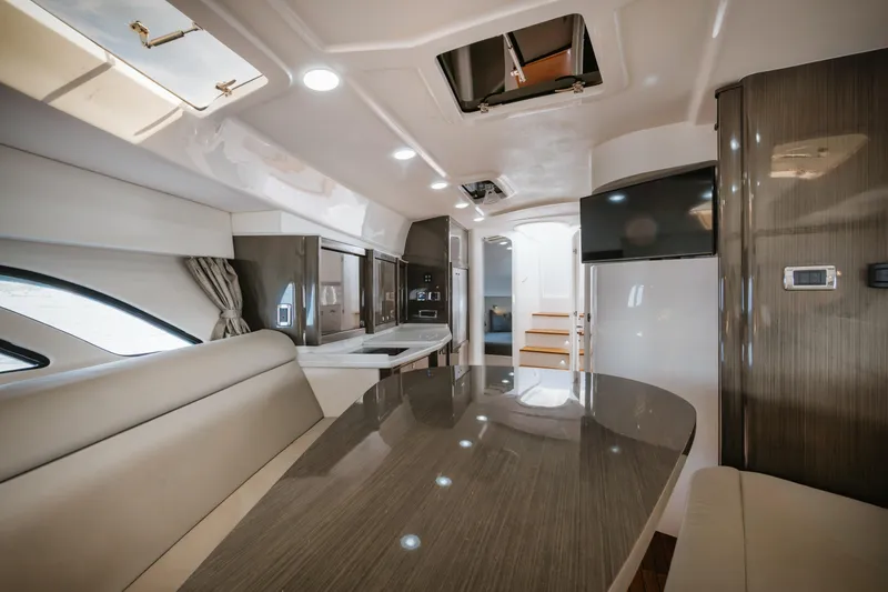 Slide: The Image of Luxurious interior of a 2018 Intrepid 475 Sport Yacht with modern furnishings and sleek design. - 42