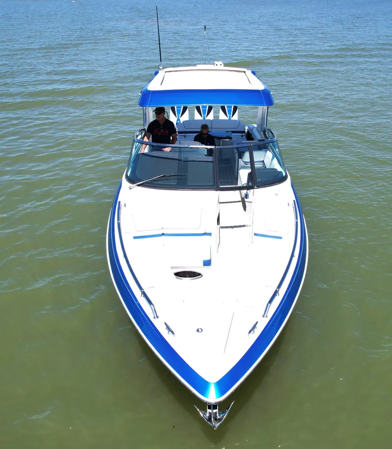 Slide: The Image of 2019 Formula 330 Crossover Bowrider OB on calm water, aerial view. - 41