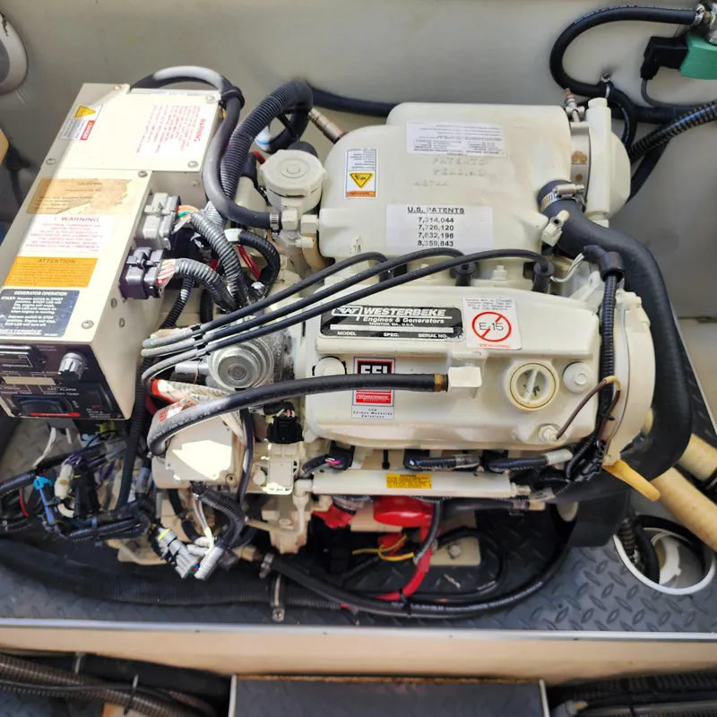 Slide: The Image of Engine compartment of a 2019 Formula 330 Crossover Bowrider OB boat. - 45