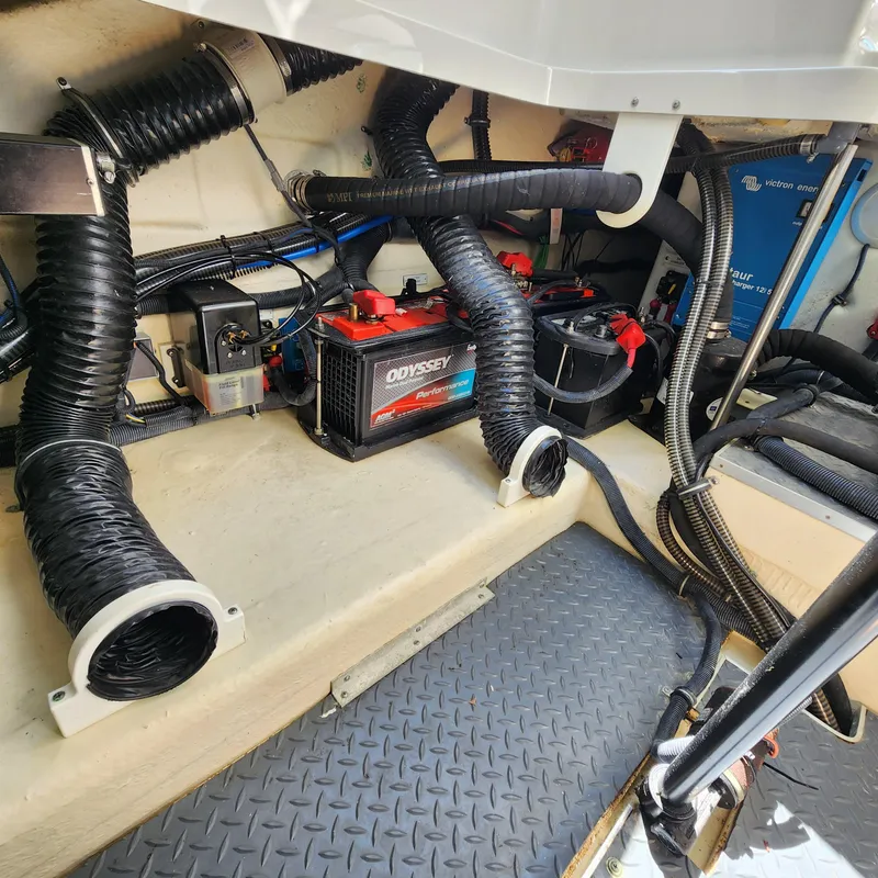 Slide: The Image of Engine compartment of 2019 Formula 330 Crossover Bowrider OB with Odyssey battery. - 52