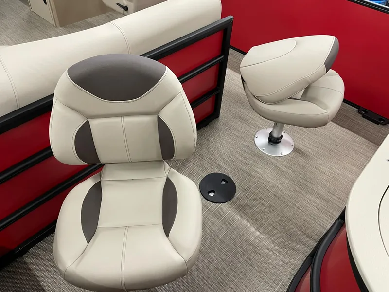 Slide: The Image of 2025 Bentley Pontoons 200 Fish-N-Cruise interior with beige and gray seating. - 11