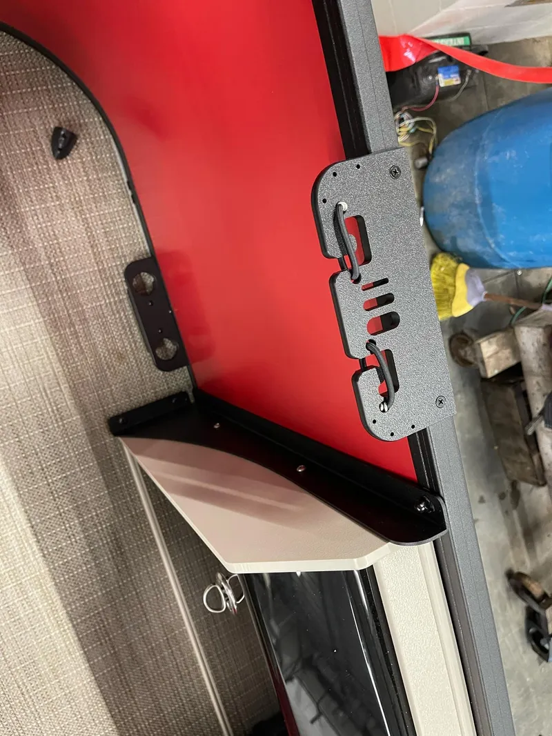 Slide: The Image of 2025 Bentley Pontoons 200 Fish-N-Cruise interior detail with red panel and hardware. - 12