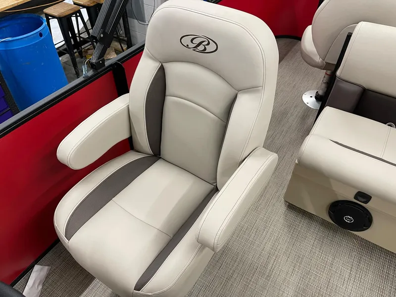 Slide: The Image of 2025 Bentley Pontoons 200 Fish-N-Cruise luxury boat seat with beige and brown upholstery. - 13