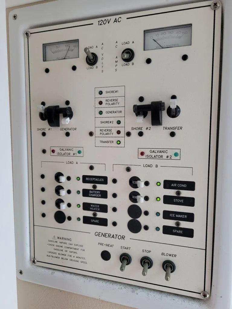 Slide: The Image of Electrical control panel on a 2005 Stamas 290 Express boat. - 16