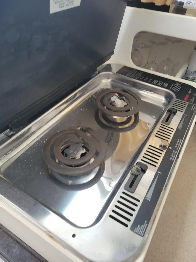 Slide: The Image of 2005 Stamas 290 Express boat stove with two burners and stainless steel finish. - 17