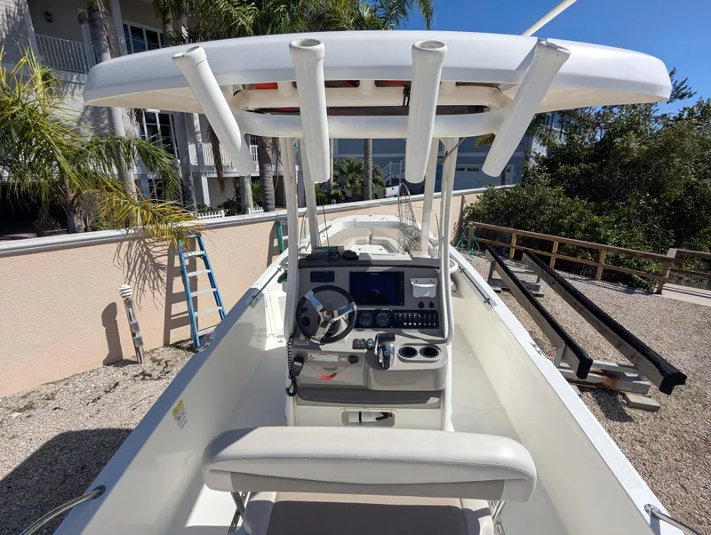 Slide: The Image of 2017 Boston Whaler 240 Dauntless boat interior with console and seating. - 4