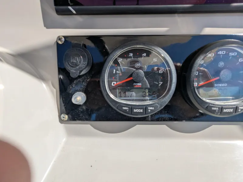 Slide: The Image of Close-up of 2017 Boston Whaler 240 Dauntless dashboard gauges and controls. - 7